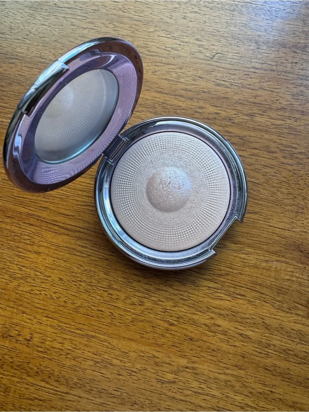 BECCA Shimmering Champagne Highlighter Compact in Pure Pearl